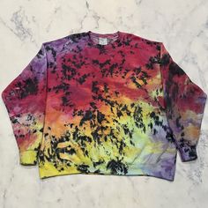 Tie Dye Crew Neck Sweatshirt Ice Dye Sweater Rainbow Black Hand Dyed -  Ready to Ship Size 3X  You will receive item in pictures. You will love wearing this unique, one of a kind, hand dyed piece of art! Awesome gift idea. Hippie, Boho/Bohemian Style, Festival Fashion. Comfortable, breathable, natural fiber fabric. Perfect for everyday wear or special occasions. I use only the highest quality fiber reactive dye. Your Tie Dye clothing won't fade and will stay vibrant for many years to come!  All items are hand tied and dyed by me. Each individual Tie Dye has it's own unique characteristics, like a snowflake. Tie dyes will arrive washed and ready to wear. Wash alone for first time only. Machine wash cold or warm water. Machine or air dry. If you have any questions please send me a message. I Hand Dyed Multicolor Relaxed Fit Sweatshirt, Hand Dyed Crew Neck Top For Fall, Casual Multicolor Hand Dyed Sweatshirt, Hand Dyed Black Crew Neck Top, Multicolor Crew Neck Sweatshirt For Fall, Black Hand-dyed Relaxed Fit Tops, Black Relaxed Fit Hand Dyed Tops, Hand Dyed Crew Neck Top For Streetwear, Hand Dyed Long Sleeve Black Tops