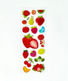 a sticker with different fruits and vegetables on it's side, in front of a white background