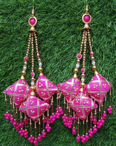 Latkan For Lehenga  Handmade Latkan, Stylish Heavy Long for Lehenga,, Hanging Latkan for Lehenga, Pillow Shaped, latkan  Color Pink  2 PC  Libas Fashion latkan Cotton POMPOM  Beautiful Pair of Latkans & Brooch Accessory For You Decorative Products. In Indian These Latkans Are Normally Used as The Accessory For Lengha & Sari Blouse On The Back, But These Can Be Used in Many Other Ways to Metal & Pearl scan be used at an door. Rajasthan is a State in India for these kind of Art works Ethnic, Casual and Party Wear Designs Lahenga party latkan beauty ,colors & fabrics Created with high quality material using Alloy Cheap Bohemian Latkan Earrings, Women's Blouse Piece With Latkans For Traditional Ceremonies, Luxury Latkans Necklaces For Women, Luxury Saree With Latkans For Festive Occasions, Cheap Party Chandelier Earrings With Latkans, Cheap Chandbalis With Latkans, Cheap Chandbalis With Latkans For Wedding, Latkan Designs For Lehenga, Moti Latkan Design