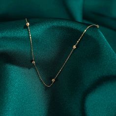 "14k Gold Beaded Satellite Necklace, Perfect for Everyday Wear, Minimalist Necklace, Beaded Chain, Layering Necklace, Gift for Her DIALOOK JEWELRY ITEM DETAILS Material: 14K Solid GOLD (Not Filled or Plated). Gold Necklace Chain Length: 16,7\" inch (42,5cm) Main Chain and 1\" inch (2,5cm) Adjustable Chain Part Total: 17,7\" inch (45cm) Chain Width: 1mm Finish: 14K Yellow Gold Featuring: 2,5mm Balls Stone: Zircon Each order will be beautifully packaged for gift giving in a jewelry box with an add Elegant 14k Yellow Gold Beaded Necklace, Elegant Yellow Gold Beaded Necklace For Gift, Elegant Chain Necklace With Tiny Beads, Dainty Beaded Chain Necklace For Formal Occasions, Elegant Beaded Chain Necklaces For Jewelry Making, Minimalist Station Necklace With Satellite Chain As A Gift, Minimalist Station Necklace With Satellite Chain For Gift, Elegant Single Strand Station Necklace As Gift, Elegant Beaded Necklace With Delicate Chain