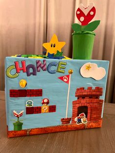 a wooden sign that says chance with mario and luigi's house in the background