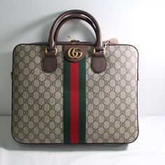 All Of My Items Are Guaranteed 100% Authentic Brand New With Tags, Dust Bag, Gucci Cards And Removable Shoulder Strap. Brand New And Never Worn Or Used Style: Briefcase Shoulder Bag Material: Gg Supreme Canvas With Brown Leather Trim Color: Beige/Ebony Style No.: 574793 Made In Italy Measurements: L 14" H 11" D 2.5" Designer Travel Briefcase With Branded Hardware, Designer Briefcase With Branded Hardware, Designer Rectangular Briefcase With Branded Hardware, Designer Business Briefcase With Branded Hardware, Classic Monogram Canvas Briefcase For Formal Use, Designer Rectangular Briefcase With Gold-tone Hardware, Designer Briefcase With Gold-tone Hardware, Designer Briefcase With Gold-tone Hardware For Daily Use, Dior Wallet On Chain