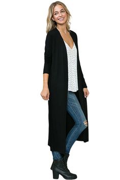 Bring a dash of style to breezy days with this Long Sleeve Solid Maxi Cardigan from Iconic Luxe. Tailored in a regular fit with a length that hits at the knees, this long-sleeve cardigan is crafted from a lightweight fabric for a cozy feel. Designed in a solid hue, you can layer the cardigan over tops or dresses for versatile styling options. 95% Rayon, 5% Spandex Made in the USA Pull On closure Features: open front, long sleeves, midi length, lightweight fabric Suit for: work, casual, everyday wear, date night, movie night, brunch, farmers market, vacation, traveling, beach, barbeque party, coffee date, school Season: spring, summer, fall, winter Model is 5’7” and wearing size Small. Hand wash cold. Do not bleach. Hang to dry. Solid Color Long Cardigan For Fall, Long Solid Color Cardigan For Fall, Solid Long Cardigan For Fall, Trendy Solid Color Open Front Sweater Coat, Trendy Open Front Solid Sweater Coat, Trendy Solid Open Front Sweater Coat, Trendy Stretch Cardigan In Solid Color, Trendy Solid Color Stretch Cardigan, Trendy Stretch Solid Color Cardigan