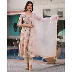 Cream colored suit is prettified with floral printed work on neck as shown which makes it appear classy. This top is made of mulmul cotton fabric which is accompanied with pure cotton bottom and organza dupatta. Women can buy this suit to wear for their parties, festive, functions and events. Note:- The actual product may differ slightly in color and design from the one illustrated in the images when compared with computer or mobile screen. Size Chart Size: Semi Stitched/Unstitched can be altere Spring Chanderi Salwar Kameez With Printed Motifs, Chanderi Salwar Kameez With Printed Motifs For Spring, Elegant Floral Print Chanderi Sets, Summer Floral Print Anarkali Set With Straight Kurta, Summer Floral Anarkali Set With Straight Kurta, Summer Floral Print Straight Kurta Anarkali Set, Spring Floral Print Cotton Silk Salwar Kameez, Fitted Floral Print Unstitched Cotton Suit, Spring Wedding Unstitched Suit With Floral Print