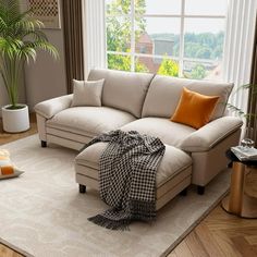 a living room scene with focus on the sectional sofa and throw pillows in the corner