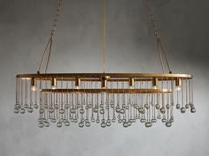 a gold chandelier hanging from a ceiling