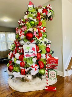 a christmas tree decorated with candy canes and ornaments