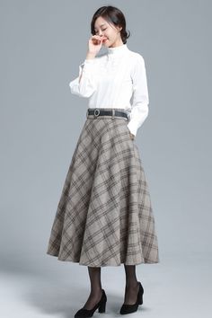 Khaki Plaid Wool Skirt 3133 – XiaoLizi Classic A-line Pleated Skirt For Fall, Beige A-line Pleated Skirt For Fall, Winter Beige Flared Skirt, Beige Flared Skirt For Winter, Winter Beige Lined Skirt, Fitted Beige Pleated Skirt For Fall, Fitted Lined Pleated Skirt For Fall, Fall Pleated Skirt For Workwear, Fall Flared Skirt With Pockets