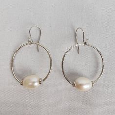 See last photo for length or size measurements, compare our measurements to something in your jewelry box to know if this piece will work for you. ❤Please check out my other listings❤   ️I'm available for questions 📫 All orders are shipped within 24 hours Mon-Fri ✨Fashion is our armor, dress well and face the world confident✨ Classic Sterling Silver Hoop Earrings With Ear Wire, Classic Handmade Teardrop Hoop Earrings, Sterling Silver Open Circle Hoop Earrings For Pierced Ears, White Oval Sterling Silver Hoop Earrings, Small Hoop Earrings With Sterling Silver Clasp For Anniversary, Silver Hoop Pearl Earrings As Gift, Handmade Silver Hoop Pearl Earrings, Silver Hoop Pearl Earrings For Gift, Anniversary Hoop Earrings With Sterling Silver Clasp