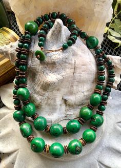 Green Coconut Beaded Vintage Boho Festoon Necklace Shortest strand measures aprox 22 inches around Longest strand measures aprox 24inches around Green Multi-strand Hand-strung Necklaces, Wooden Beads Round Necklace For Beach, Green Hand-strung Beaded Necklace For Festival, Large Beads Long Necklace For Beach, Green Hand-strung Beaded Necklaces For Festival, Hand-strung Green Beaded Necklaces For Festivals, Hand-strung Green Beaded Necklace For Festival, Beach Jewelry: Long Necklace With Large Beads, Adjustable Double Strand Necklaces With Wooden Beads