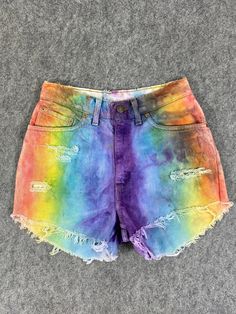 Dye Rainbow Vintage Levi's Short Jeans 26x2.5 - JN3357 Size: 26 Item Description tag  Levi's Actual measurement (inches) Waist - 26 Front Rise - 11 Hips - 37 Thigh - 11 Knee -  Leg Opening - 21 Inseam - 2.5 Outseam - 11.5 Material : Cotton  *Disclaimer: Product color may slightly vary due to photographic lighting sources or your monitor settings.  #JN3357 Vintage Levi Shorts, Rainbow Vintage, Faded Denim, Short Jeans, Levi Shorts, Grunge Style, Photographic Lighting, Grunge Fashion, Vintage Levis