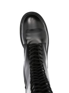 Find BALENCIAGA Strike Lace-up Leather Boots on Editorialist. black calf leather embossed logo to the front and to the rear round toe front lace-up fastening side zip fastening pull-tab at the opening knee-high branded leather insole 20mm chunky rubber lug sole We've partnered with Good On You — an independent agency that rates how brands perform in relation to their impact on the planet, people and animals, with a multi-criteria rating simplified to a five points scale. In order to be awarded our conscious label, larger brands need to score a minimum of four out of five ('Good'), while smaller brands must score at least three out of five ('It's a start'). This item comes from a brand rated four out of five ('Good') by Good on You at the time it was added on FARFETCH. Please note, this is Classic Lace-up Boots With Lug Sole In Calf Leather, Black Plain Toe Lace-up Boots In Calf Leather, Black Plain Toe Calf Leather Lace-up Boots, Black Plain Toe Lace-up Calf Leather Boots, Black Calf Leather Lace-up Boots With Plain Toe, Classic Leather Combat Boots With Rubber Sole, Business Combat Boots With Round Toe In Calf Leather, Classic Calf Leather Lace-up Boots With Reinforced Heel, Classic Lace-up Boots With Reinforced Heel In Calf Leather