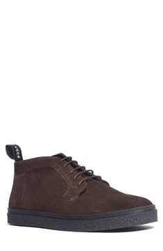 A clean, classic silhouette defines a stylish chukka boot built from rich suede leather. Leather upper and lining, rubber sole Imported Fall Suede Chukka Boots With Leather Footbed, Suede Lace-up Chukka Boots For Work, Suede Lace-up Chukka Boots For Fall, Casual High-top Chukka Boots With Leather Lining, Suede High-top Boots For Business, High-top Suede Boots For Business, Classic Chukka Boots With Suede Lining For Business Casual, High-top Suede Workwear Boots, Suede Desert Boots With Leather Footbed For Fall