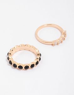 Embellish your look with these simple stacking rings! This dainty duo includes two gorgeous, gold-toned bands adorned with black and crystal diamantes for a two-toned inspired look. Layer them stacked ontop of each other for a curated finish. Material: Crystal Dimensions: Diameter 17.5mm x Band Width 4mm | Lovisa Gold Rounded Band Stacking Rings, Size: Medium/Large, Black Elegant Black Metal Midi Rings, Simple Stacking Rings, Favorite Rings, Stacking Rings, Ring Necklace, Large Black, Band Rings, Two Tone, Ring Size