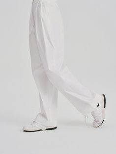 Details: Clean and pure white wide leg pants High-waisted straight-leg shape Pleated waist for a strong sense of layering Side slash pockets Loose hem, floor-length pants Materials & Care: Viscose 39.9%, Nylon 30.2%, Cotton 25.5%, Spandex 4.4% Hand wash | Dry clean Do not bleach Size & Fit: Model is 5'7", Bust 32, Waist 24, Hips 35, wearing a size S Item #: WM2PA17 Wide Leg Pants High Waisted, White Wide Leg Pants, Casual Wide Leg Pants, Pantalon Large, Pure White, Leg Pants, Wide Leg Pants, Floor Length, Straight Leg