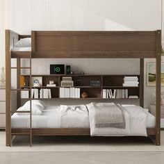 there is a bed with a book shelf on the top and white sheets underneath it