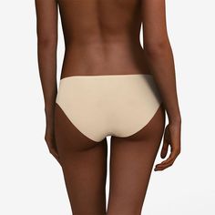 The Chantelle Soft Stretch Bikini panty is a wardrobe must-have. Stay comfortable all day in this seamless brief. Flat bonded finishes make this style seamless and invisible under any outfit. The seamless Bikini from the pioneering one size underwear program that truly fits. This innovative style has luxe, high performance fabric that is engineered to last, retain its stretch and adapt to all body types. Loved by editors and customers alike, this award winning underwear is an easy fit for any se Seamless Second-skin No-show Shapewear, Elegant Seamless Shapewear With Minimal Stretch, Smoothing Shapewear With Minimal Stretch, Compressive Smoothing Swimwear, Seamless Micro-elastic No-show Shapewear, Micro-elastic Shapewear With Smooth Texture, Micro-elastic Smooth Texture Shapewear, Bra Friendly Micro-elastic Brief Shapewear, Bra-friendly Micro-elastic Brief Shapewear