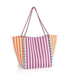 This double sided beach tote is absolutely adorable! A turquoise pattern on one side, and a purple on the other! Color: Turquoise (purple stripe on back) L 22.5" × W 10" × H 13.5"; Hnd 11" Material: Polyester Double Cord Handles Magnetic Snap Closure 1 Inner Slip Pocket Rectangular Vacation Bags With Striped Lining, Rectangular Vacation Bag With Striped Lining, Beach Tote Shoulder Bag With Striped Lining, Multicolor Rectangular Bag For Poolside, Striped Tote Beach Bag, Striped Rectangular Beach Bag For Shopping, Summer Rectangular Shoulder Bag With Striped Lining, Rectangular Striped Shoulder Bag For Beach, Striped Rectangular Shoulder Bag For The Beach