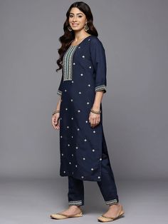 Grab this beautiful 3-piece set. The set comes with ethnic motif print & embroidered straight shape kurta has round neck, 3/4th flared sleeves & calf length teamed with solid trouser pant with slip on closure & semi elasticated waistband and a dupatta. Color - Navy Blue Kurta Fabric-Silk Blend Pant Fabric-Silk Blend Dupatta Fabric - Silk Chiffon Neck-Round Neck Sleeves-3/4th Sleeves Work - Ethnic Motif Print & Embroidery Detailing Washing Instructions-Dry Clean DISCLAIMER - The color of the product may be differ due to screen settings of device. A misprint here and a color drop slip there is the beauty of printing which is not treated as a defect. Diwali Straight Kurta Palazzo Set With Motifs, Diwali Palazzo Set With Straight Kurta And Motifs, Navratri Sets With Motifs And Straight Kurta, Blue Straight Kurta Set With Motifs, Eid Salwar Kameez With Motifs And Straight Kurta, Blue Sets With Motifs And Straight Kurta, Blue Long Sleeve Sets With Motifs, Blue Kurta, Formal Jewelry