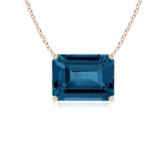 Featuring a contemporary design, this 14k rose gold east-west pendant looks captivating. The emerald cut London blue topaz is horizontally mounted in a prong setting. Blue Topaz Pendant Necklace, Solitaire Pendant, Yellow Gold Chain, East West, London Blue Topaz, London Blue, Blue Hues, 18k Rose Gold, Emerald Cut