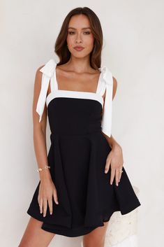 Length from shoulder to hem of size S: 80cm. Chest: 38cm, Waist: 33cm, size S. Mini dress. Lined. Model is a standard XS and is wearing XS. True to size. Non-stretch. Tie-up white shoulder straps. Flowy skirt. Zipper with hook eye closure. Dry clean only. Polyester. Own the room when you step in with the Sunday Nights Mini Dress. Featuring tie-up white shoulder straps and a gorgeous flowy skirt. Style with heels for likes! First Day Outfit, Prom Shopping, Skirt Zipper, Bridal Shower Dress, Shower Dresses, Jumpsuits And Romper, Mini Dress Black, Long Sleeve Lace Dress, Dresses Backless