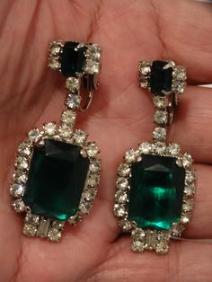 "Earrings size 2\" inch long x 3/4\" inch wide, 17 grams weight excellent condition." Green Costume Jewelry Earrings For Wedding, Green Jeweled Earrings For Formal Occasions, Green Jeweled Jewelry For Evening, Green Jeweled Evening Jewelry, Green Clip-on Jewelry For Party, Vintage Green Crystal Jewelry, Formal Green Rhinestone Jewelry, Green Emerald Crystal Earrings For Formal Occasions, Green Sparkling Stones Earrings For Party