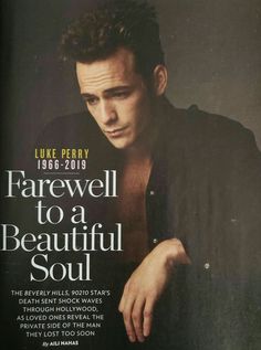 a magazine cover with a man in black shirt on the front and back covers,