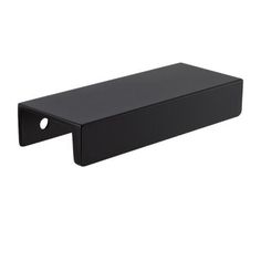 a black shelf with holes on the bottom and one hole in the middle for storage