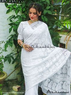 The Chikan Label White Georgette Jaal Saree Lucknawi Chikankari SariPRODUCT  DETAILSThe Chikan label Designer studio presents White Georgette Jaal Saree Lucknawi Chikankari Sari. This collection one of the most closest to our heart. Each saree takes more than 1.5 month to complete. And the only tools our women artisan uses are needles & her hands. She pours all her love and dedication into it as if nurturing a newborn child. Abundance of hardwork and creativity goes into making these delicat Traditional White Lace With Intricate Embroidery, White Traditional Blouse With Chikankari Embroidery, Traditional White Chikankari Embroidery Blouse Piece, Traditional Fitted Lace Wear, Fitted Lace Traditional Wear, Unstitched White Blouse Piece With Chikankari Embroidery, Unstitched White Chikankari Embroidery Blouse Piece, White Anarkali Blouse With Chikankari Embroidery, White Chikankari Embroidery Blouse Piece Unstitched