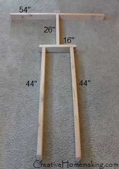 the measurements for an unfinished shelf are shown in front of a white carpeted floor