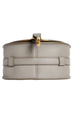 Curvaceous detailing and gleaming hardware ornament the saddle-shaped flap of a crossbody bag crafted from sumptuous grained leather in a compact silhouette. Front flap closure Adjustable crossbody strap Exterior slip pocket beneath flap Interior card slot Textile lining Leather Made in Italy or Spain Designer Handbags This brand has B Corp certification, representing business practices with emphasis on social and environmental performance, accountability and transparency This brand meets Nordst Luxury Saddle Bag With Gold-tone Hardware, Luxury Saddle Bag With Detachable Strap And Top Handle, Luxury Top Handle Belt Bag For Formal Occasions, Luxury Saddle Bag With Detachable Strap For Evening, Formal Crossbody Saddle Bag With Detachable Handle, Luxury Office Belt Bag With Detachable Strap, Designer Evening Belt Bag With Detachable Strap, Luxury Formal Shoulder Belt Bag, Luxury Saddle Bag With Silver-tone Hardware