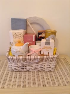 a white basket filled with lots of different items