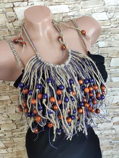 Boho chic fringe ethnic necklace. This is unusual necklace . It looks like a piece of nature. The necklace is made linen yarn and wooden beads. An excellent jewelry for summer festivals, parties and for every day. This is a unique necklace that will only be with you. Fans of eco-jewelry this is bohemian fringe necklace for you. This is an nice gift to mom, sister, girlfriend, wife or loved one. Material: 100% linen, cord,  wooden beads Size:  adjustable (fringe length 23 cm / 9 in) *Please bear Eco Friendly Necklace, Afro Punk Fashion, Unusual Necklace, Boho Chic Necklace, Eco Jewelry, Silk Necklace, Summer Festivals, Braided Necklace, Linen Yarn