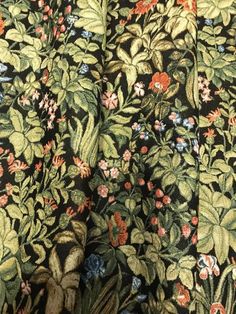 closeup of the fabric with flowers and leaves on it