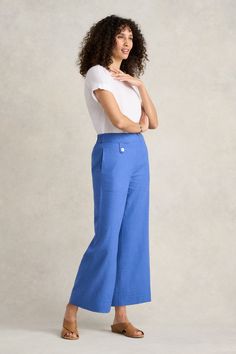 This fabulous 7/8 length pant has a wide leg silhouette which is both flattering and trendy. Crafted from comfortable linen rayon in Cobalt Cross Dye, this pant looks gorgeous when paired with a white shirt or colourful blouse. For suit-inspired styling, match it with our contemporary Linen Jacket from The Pink House collection. Colourful Blouse, The Pink House, Colorful Blouses, Pink House, Pink Houses, Linen Jacket, Wide Leg Pant, Wearing Clothes, Sustainable Clothing