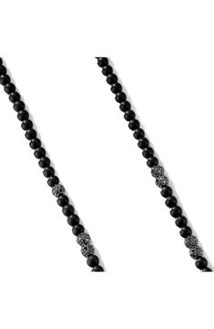 Sterling silver. Black onyx. Pavé black diamonds, total diamond weight: 6.84ct. Push clasp. Necklace, 6mm width. Imported. >Diamond Guide Luxury Black Necklace With Polished Beads, Luxury Black Polished Beads Jewelry, Luxury Black Jewelry With Polished Beads, Luxury Black Polished Bead Jewelry, Black Onyx Jewelry With Polished Beads, Luxury Black Beaded Necklaces, Luxury Black Jewelry With Gemstone Beads, Luxury Black Round Beaded Jewelry, Luxury Formal Jewelry With Black Beads