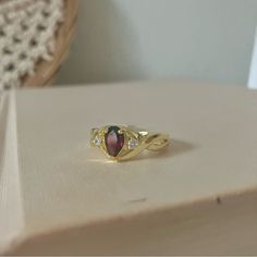 Nwt Pear Garnet Gold Promise Engagement Ring “Scarlette” Red Coffin Teardrop Jewelry Condition: New With Tags. Details: Lovely Costume Jewelry Ring In Gold Tone (Metal Is Untested And Unmarked), With Twisting Shanks Around A Pear Shaped Garnet, Accented With Clear Stones, Approximately Size 7.75 (Tag Is Marked As An 8). Elegant And Classic, A Perfect Promise Ring. Tested Center Stone In The Garnet/Tourmaline/Iolite Range On A Presidium Gem Tester. The Names In Quotations Of Titles Are Part Of My Deep Red Jewelry, Gothic Garnet Ring, Garnet Jewelry Aesthetic, Brand Keywords, Process Aesthetic, Ballerina Trend, Red Coffin, Teardrop Jewelry, Edwardian Engagement Ring