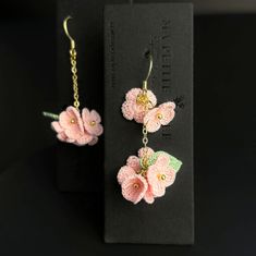 Introducing our Mismatched Pink Flower Drop Earrings, perfect for adding a touch of whimsy and charm to any outfit. These fairy-inspired earrings embrace the cottage-core and forest core aesthetics, making them ideal for spring. Delicately handcrafted, they capture the essence of nature's beauty. A unique and thoughtful Japanese gift for her, these earrings are perfect for anyone who loves nature-inspired jewelry. . . . . . . . . . . . . . . . . . . . . . . . . . . . . . . . . . . . . Personaliz Handmade Feminine Dangle Flower Earrings, Handmade Feminine Flower Earrings For Party, Gold Whimsical Flower-shaped Earrings, Whimsical Flower-shaped Handmade Earrings, Delicate Flower Charm Earrings, Handmade Feminine Drop Flower Earrings, Handmade Feminine Flower Earrings, Handmade Feminine Flower Shaped Earrings, Handmade Feminine Flower-shaped Earrings