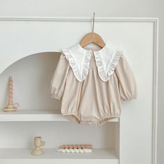 "Get ready to dress up your little one in style with our Cotton Romper! Made with soft cotton for all-day comfort, this long sleeve romper features a unique pointelle ruffled collar for added charm. Perfect for any occasion, this romper is sure to make a statement." This item requires 10-14 days processing time before shipping. Bodysuit Dress, Newborn Romper, Cotton Romper, Knit Bodysuit, Romper Outfit, Ruffle Romper, Ruffled Collar, Cotton Leggings