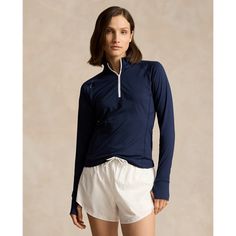 Made with stretch jersey for ease of movement a slim fit and UV protection make this performance quarter-zip pullover an ideal base layer. Quarter Zip Pullover, Navy Women, Base Layer, Quarter Zip, Uv Protection, Ralph Lauren, Slim Fit, Navy, Sweatshirts