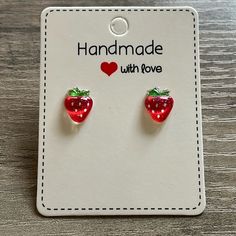 This Listing Is For A Pair Of Handmade Strawberry Earrings. Earring Stud Is 5mm And Made Out Of Stainless Steel. Hypoallergenic Earring Post And Earring Back. The Charms Are Made Out Of Resin. Super Cute For Kids Or Adults! **Comes From A Smoke Free Home** Trendy Red Earrings For Birthday, Handmade Red Sweet Earrings, Cute Adjustable Earrings For Mother's Day, Playful Red Hypoallergenic Jewelry, Sweet Red Earrings For Gift, Fun Earrings For Mother's Day Gift, Cute Nickel-free Earrings For Mother's Day, Sweet Handmade Earrings For Gift, Sweet Handmade Earrings As Gift