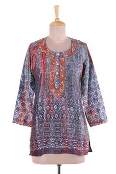 Designed by Shalabh this fashionable tunic from India features intricate printed patterns in tones of grey burnt sienna and buff. Beautiful floral motifs are embroidered by hand along this tunic's button-up neckline. Embroidered Multicolor Tops For Eid, Festive Fall Kurta With Printed Motifs, Festive Printed Kurta For Fall, Printed Tunic For Eid, Bohemian Long Sleeve Tops For Eid, Long Sleeve Block Print Tunic For Eid, Printed Long Sleeve Tunic For Eid, Long Sleeve Multicolor Tunic For Festive Occasions, Long Sleeve Printed Tunic For Eid