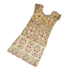 "Item Description Stunning pure silk off white colored hand embroidered kantha long Kurta Top. This dupatta is adorned with beautiful peacock design pink, yellow, green, brown thread work all over done. This stole from Bengal is hand embroidered with the traditional kantha running stitch in a beautiful floral pattern. Specialties :: KANTHA:Kantha is a hand embroidery style traditionally practiced by rural womenfolk in state of West Bengal. Kantha embroidery is recognized by running stitches. The Traditional Cream Choli With Floral Embroidery, White Traditional Embroidered Dress With Zari Work, Traditional White Embroidered Dress With Zari Work, Traditional Cream Embroidered Festive Dress, Cream Embroidered Choli For Festivals, Traditional White Chanderi Embroidered Dress, Traditional White Embroidered Chanderi Dress, Traditional Beige Choli With Intricate Embroidery, Traditional Beige Embroidered Dress With Resham Embroidery