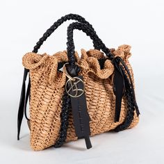 🍃Handmade Small Raffia Handbag with Knitted Rubber Rope Top Handles (Bulk orders available)  🍃This beautiful, handwoven raffia handbag is the perfect summer accessory. It's small and compact, but roomy enough to hold all your essentials, like your phone, wallet, and sunglasses. The knitted rubber handles add a touch of style and comfort, and the natural raffia straw is breathable and lightweight, making it perfect for hot summer days.  🌿Why you should buy it: Handwoven with natural raffia str Black Woven Straw Satchel Bag, Black Woven Satchel Straw Bag, Brown Braided Rectangular Bag, Brown Bucket Crochet Bag With Braided Detail, Braided Crochet Bucket Bag For Daily Use, Brown Braided Bucket Crochet Bag, Brown Braided Crochet Bucket Bag, Casual Rectangular Straw Bag As Gift, Casual Rectangular Straw Bag Gift