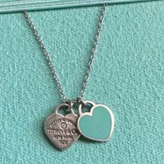 Looks Good, Could Use A Polish :) One Of The Hearts Has A Diamond, The Other One Is Blue Enamel. Comes With Tiffany Box, Tiffany Necklace Holder And Tiffany Shopping Bag Seen In Photos Return To Tiffany Necklace Double Heart, Tiffany Double Heart Necklace, Tiffany And Co Heart Tag Necklace, Return To Tiffany Heart Tag Pendant, Letter Pendant Necklace Tiffany & Co., Silver Pendant Necklace Tiffany & Co., Tiffany Box, Tiffany Necklace, Heart Tag