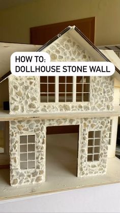 a doll house with the words how to build a dollhouse stone wall on it