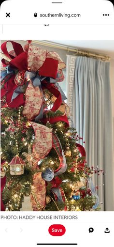 a christmas tree is decorated with red, white and blue ribbons for the holiday season