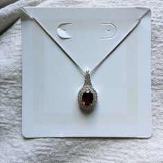 Garnet Necklace With Sterling Silver 18” Chain. Never Worn. Classic Red Pendant Necklace, Classic Red Teardrop Pendant Jewelry, Classic Red Oval Pendant Necklace, Classic Red Teardrop Pendant Necklace, Garnet Necklace, Lady In Red, Womens Jewelry Necklace, Garnet, Jewelry Necklaces