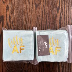 two napkins sitting on top of each other with the words party af printed on them