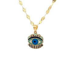 Unlock the mystical allure of ancient Egypt with our Hand-Painted Egyptian Evil Eye Pendant. This beautifully hand-crafted piece of jewelry seamlessly combines the timeless power of the Evil Eye symbol with the rich cultural heritage of Egypt, resulting in a stunning and meaningful accessory. Product Specifications:  * Material: 14k Solid Gold, hallmarked 14K or 585 for authenticity * Length: 23mm / 0.90in * Height: 17mm / 0.67in  Delivery:  * Ready to ship in 1 business day. * Delivers in 1 to 5 days depending on location and delivery option. * Returns are accepted within 7 days from the delivery date, at the customers cost. Gift Option: * We cherish the joy of gifting, as do you and your loved ones. Feel free to inform us if            you desire an additional personalized note with your Gold Hand Painted Jewelry Gift, Hand Painted Gold Jewelry Gift, Hand Painted Yellow Gold Jewelry As A Gift, Hand Painted Yellow Gold Jewelry As Gift, Hand Painted Yellow Gold Jewelry For Gifts, Hand Painted Yellow Gold Jewelry Gift, Gold Jewelry With Artistic Design, Spiritual Hand-painted Round Jewelry, Spiritual Hand Painted Round Jewelry